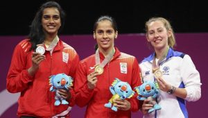 Saina Nehwal PV Sindhu and Kirsty Gilmour pose with their medals in CWG 2018